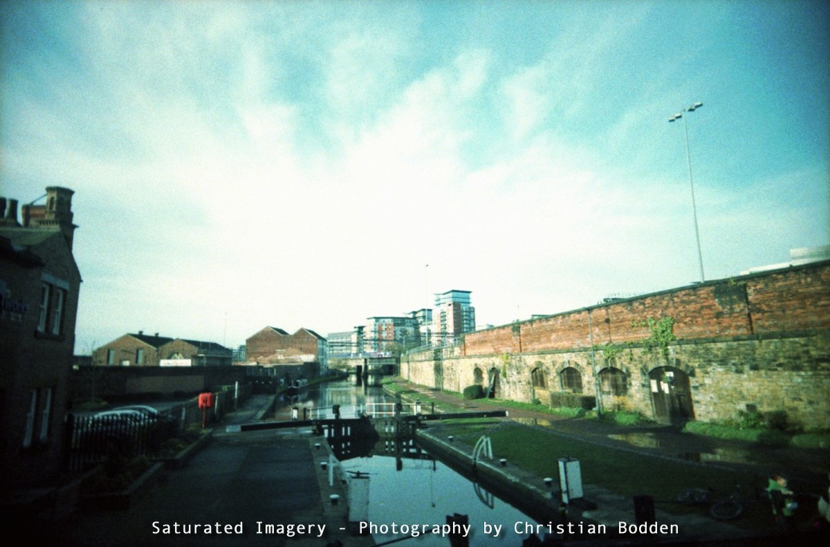 Cross Processed Film Photography of a Lock on a canal