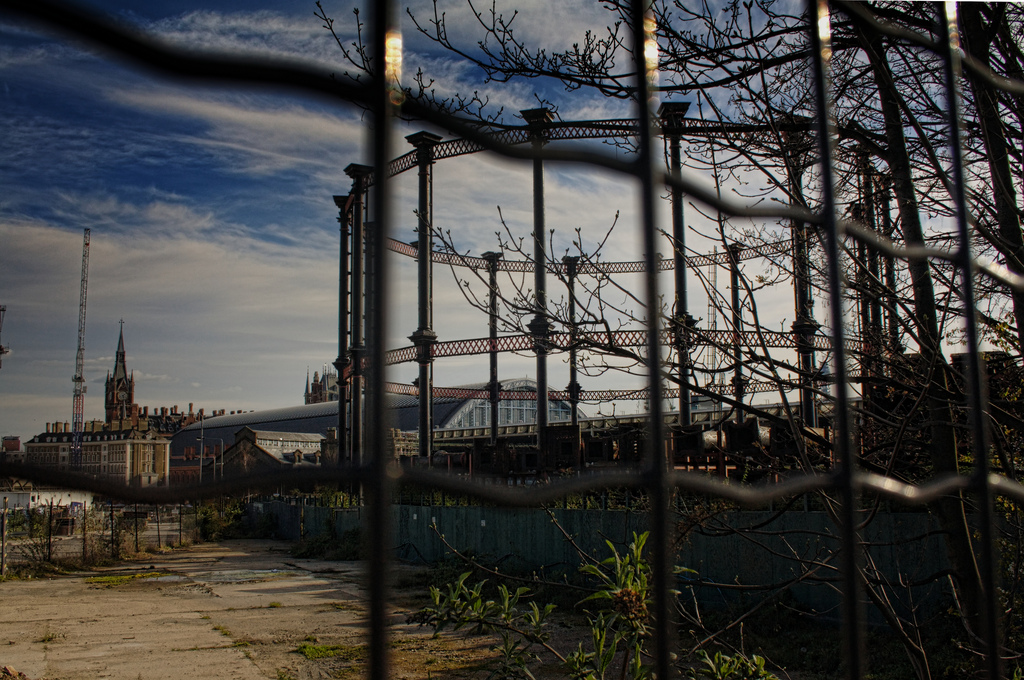 Image of a Victorian Gas Holder with St Pancras Station in background