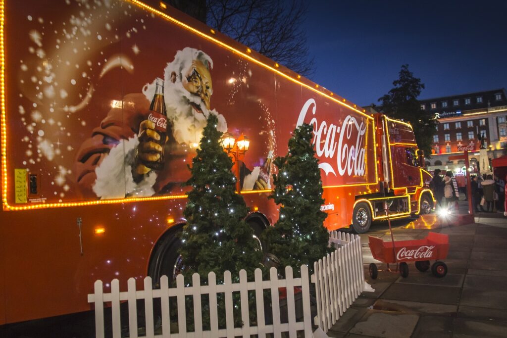 Coca Cola Branded Truck in twilight glowing up bright