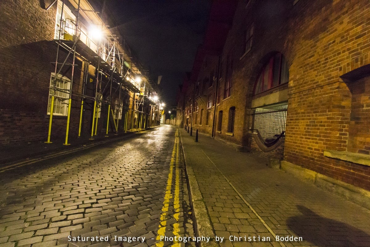 Image of a cobbled street at night
